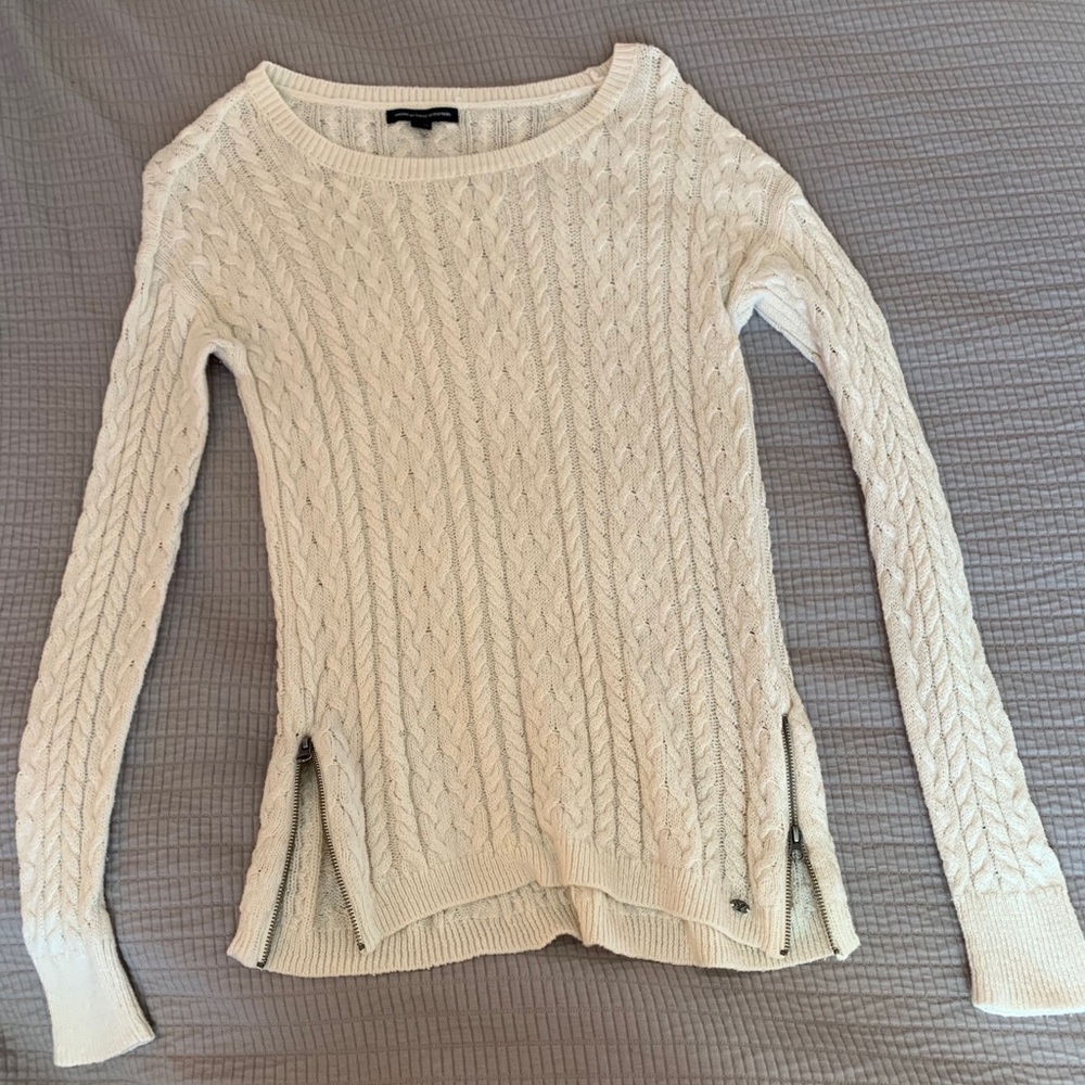 a white sweater